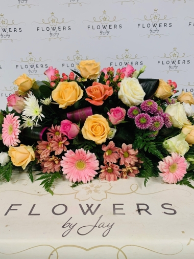 Pinks & Peaches Casket Spray
